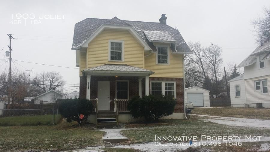 1903 Joliet St - Photo 3 of 13