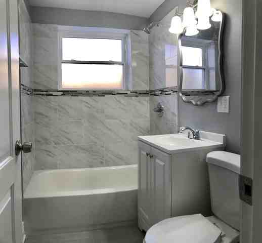 9016 S Woodlawn Ave - Photo 3 of 5