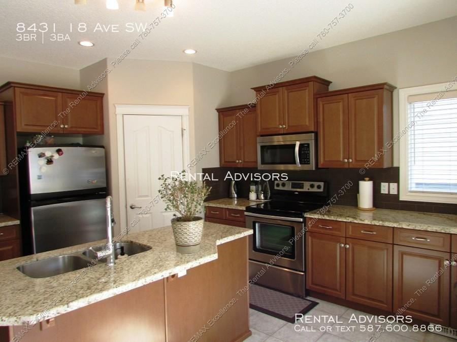 8431 18 Ave SW - Photo 2 of 10