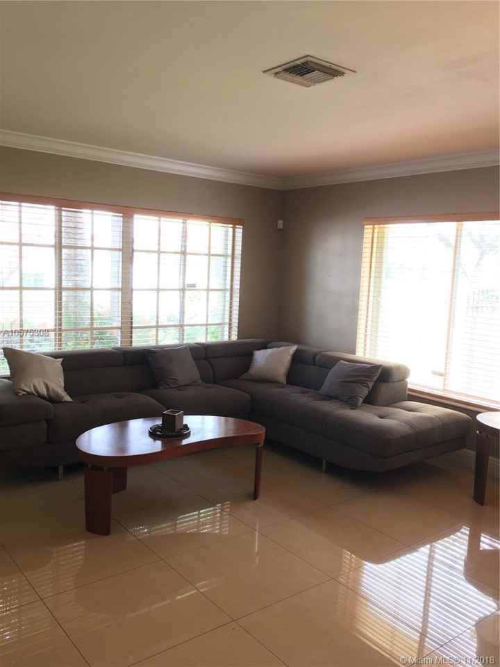 8852 NW 188 TER - Photo 2 of 6