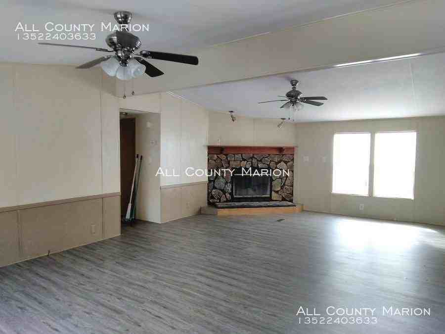 5798 NW 185th St - Photo 3 of 13