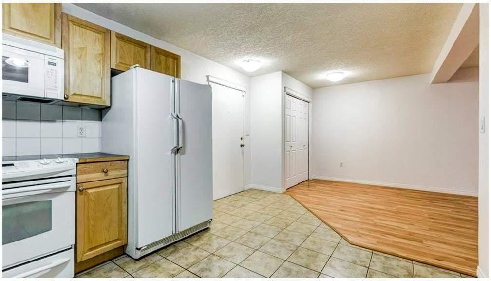 1528 11 Ave SW #104 - Photo 3 of 7