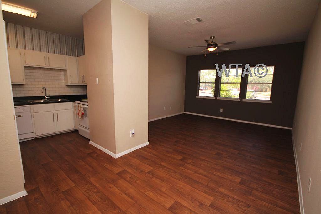 1005 W STASSNEY LN - Photo 3 of 21