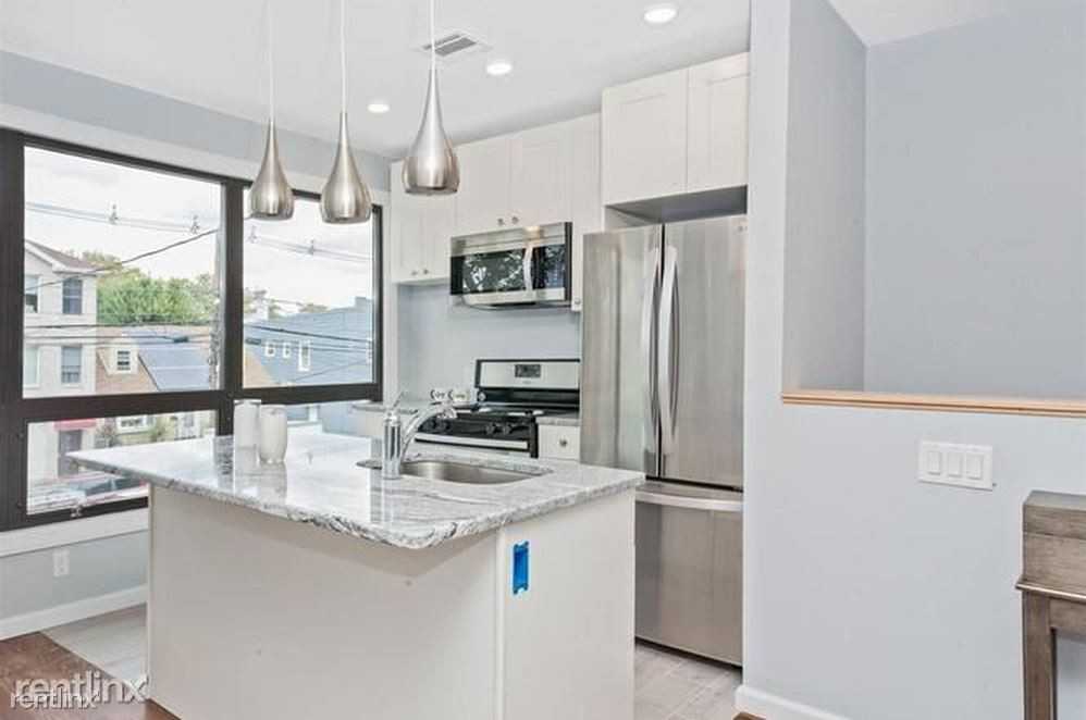 130 W Side Ave - Photo 3 of 5