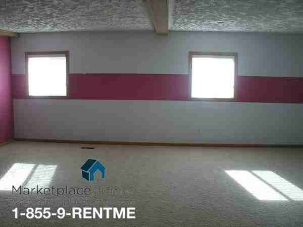 8943 Singing Hills Dr NE - Photo 2 of 14