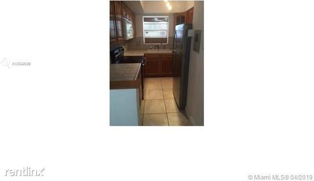 VILLAGE AT DADELAND CONDO - Photo 2 of 6