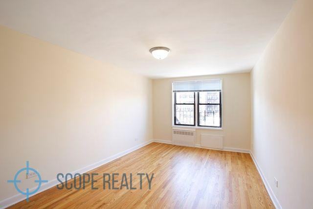 E 13th St #2C - Photo 2 of 5