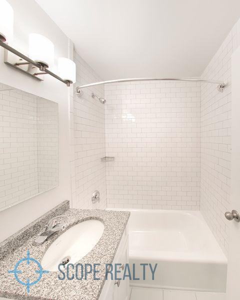 E 13th St #2C - Photo 3 of 5