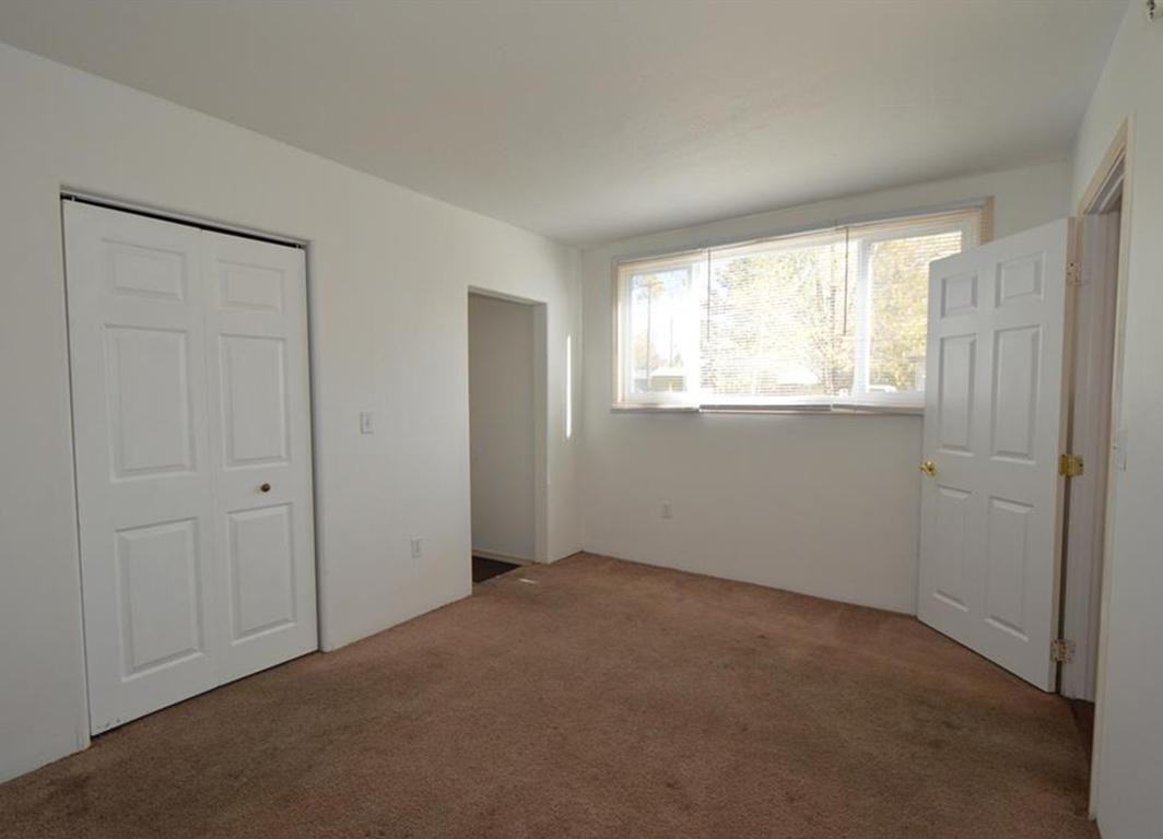 702 3Rd Ave W - Photo 7 of 19