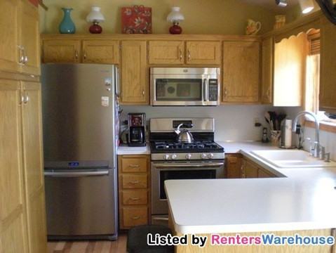 5710 Quam Ave NE - Photo 2 of 6