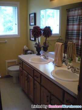 5710 Quam Ave NE - Photo 3 of 6