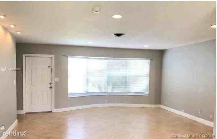 6119 NW 18th Ct - Photo 2 of 12