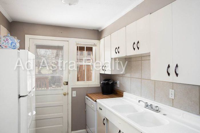 419 E 63rd Terrace - Photo 2 of 21