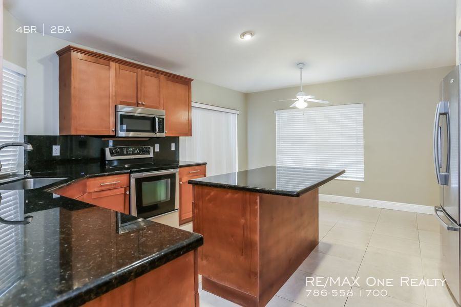 5563 NW 62nd Ave - Photo 3 of 9