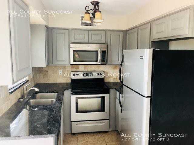 1521 Adams Cir E - Photo 2 of 15