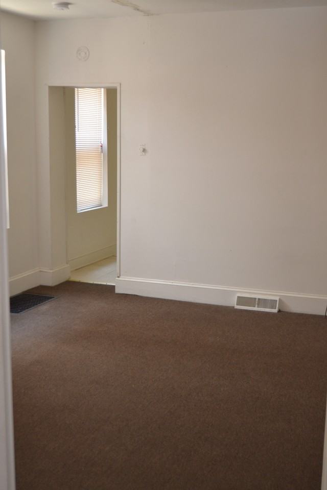 110 E 24th St - Photo 2 of 7