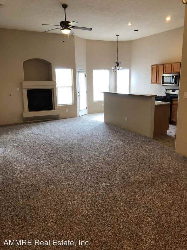 9301 Tephra Pl NW - Photo 2 of 14