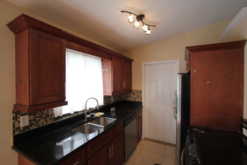 111 Newham Way - Photo 3 of 7