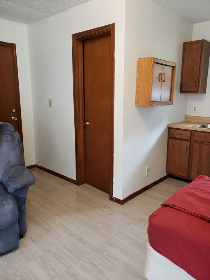 1411 S 122nd E Ave - Photo 3 of 4