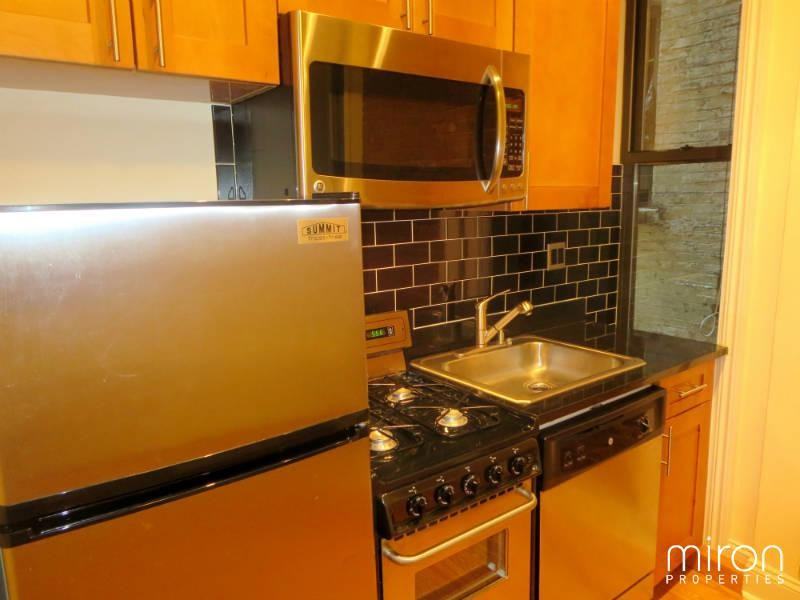 W 98th St #202 - Photo 2 of 4