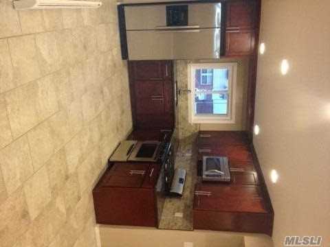 82-11 149th Ave - Photo 3 of 7