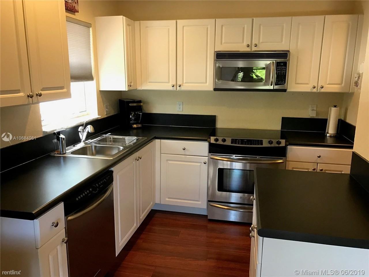 2000 NW 99th Way - Photo 3 of 13