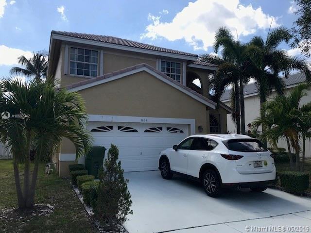 1164 NW 184th Ter - Photo 2 of 17