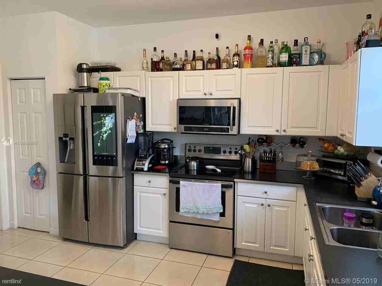 9009 SW 214th St - Photo 2 of 6
