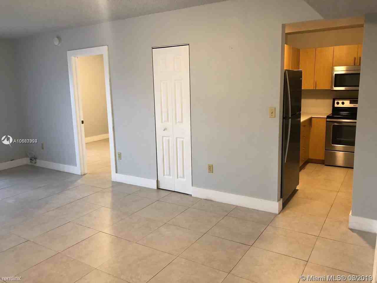4855 NW 7th St - Photo 2 of 8