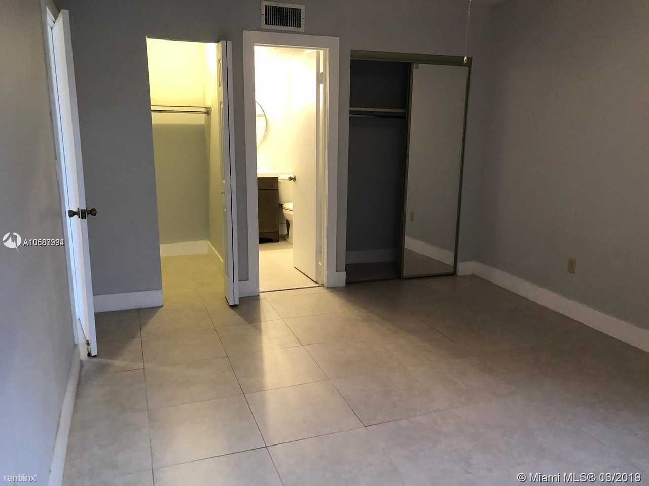 4855 NW 7th St - Photo 3 of 8