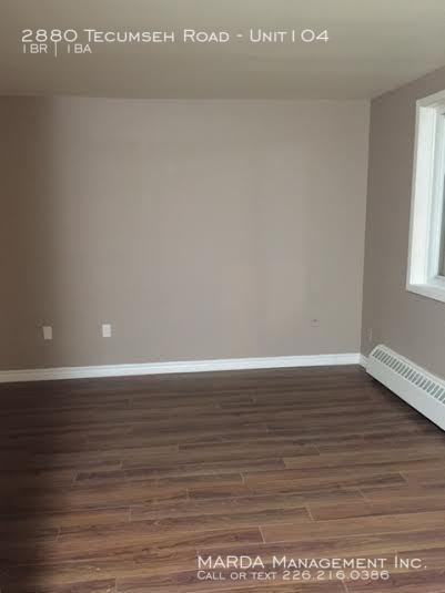 2880 Tecumseh Rd W - Photo 2 of 12