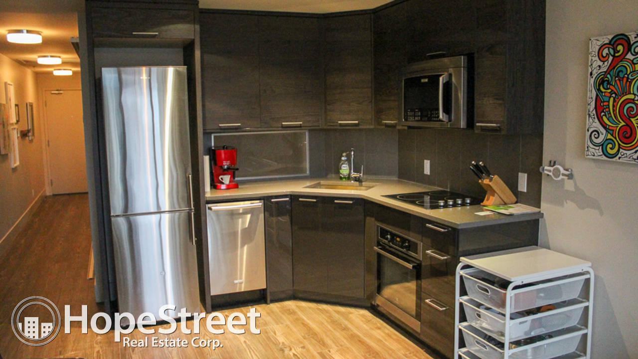 1087 2 Ave NW - Photo 2 of 6