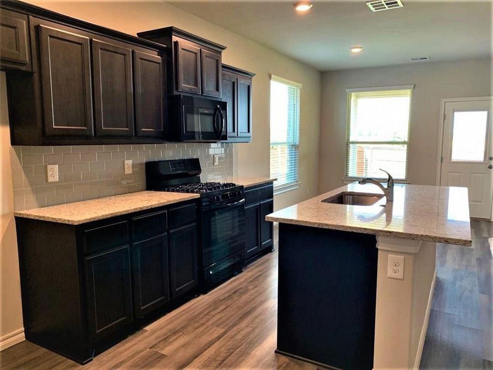 9521 Timberwind Ln - Photo 3 of 5