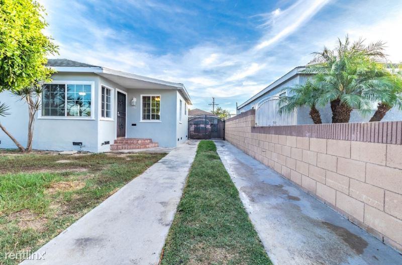 932 W 130th St Back Home - Photo 2 of 15