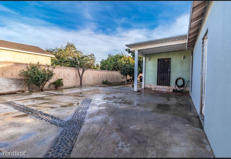 932 W 130th St Back Home - Photo 3 of 15