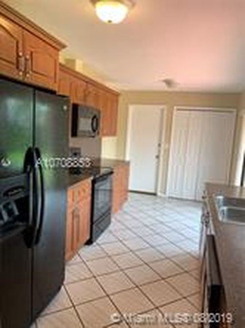 13427 Southwest 45th Lane - Photo 2 of 8