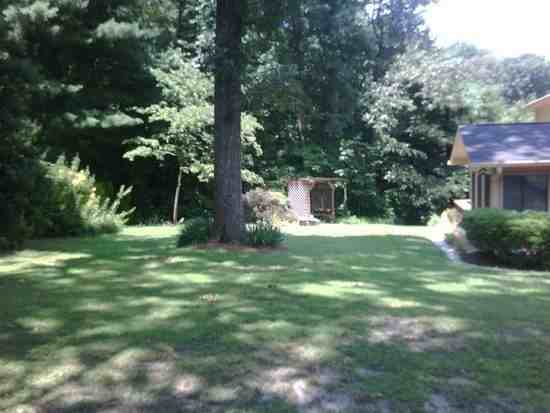 7040 Glenridge Dr NE - Photo 2 of 7