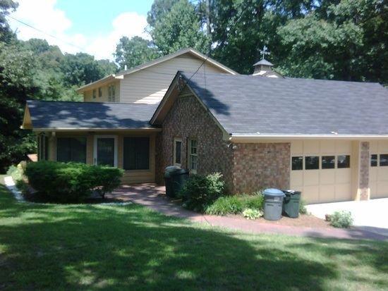 7040 Glenridge Dr NE - Photo 3 of 7