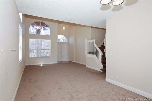 10619 Northwest 48th Street - Photo 3 of 8