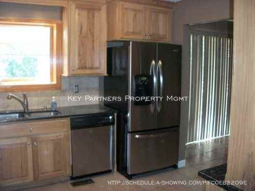 9719 W 51st Place - Photo 2 of 10