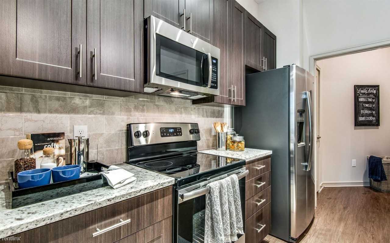 1100 Lake Carolyn Pkwy - Photo 2 of 6