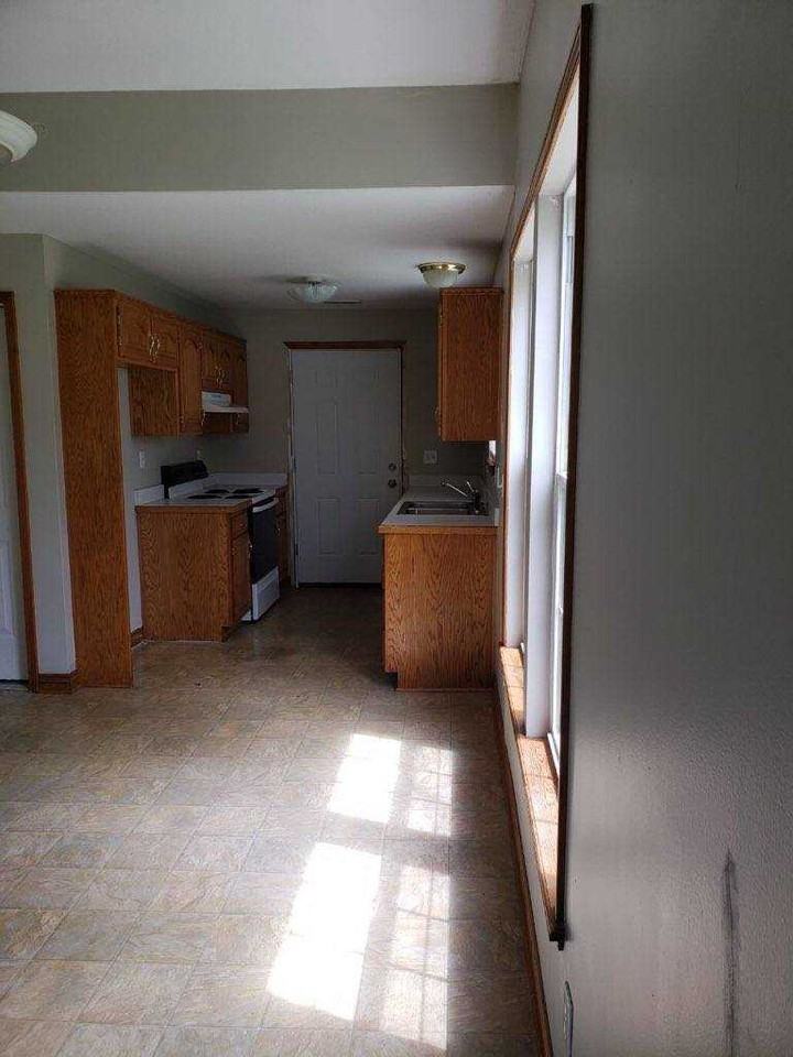 21551 S Peculiar Dr - Photo 3 of 6