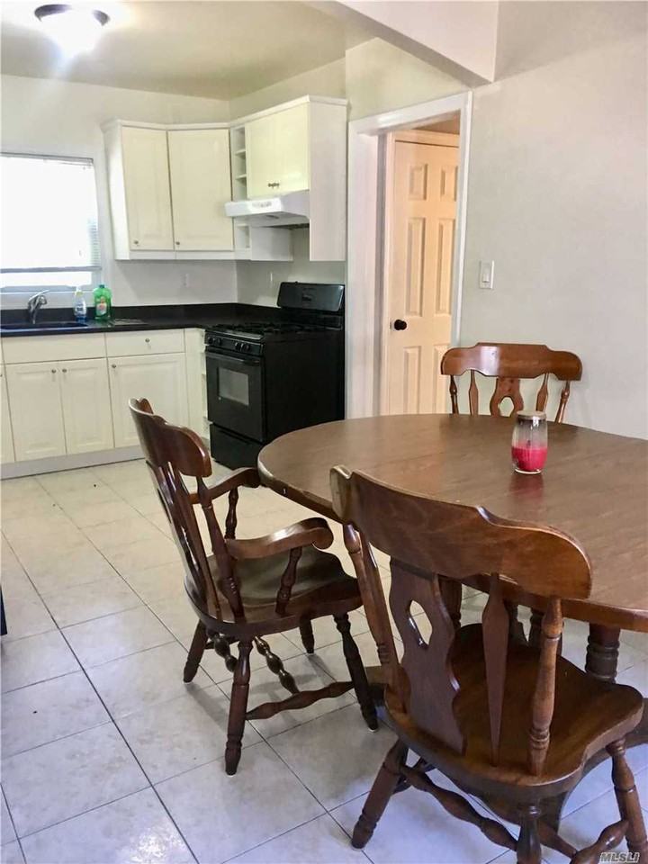 5742 57-42 73 Street - Photo 2 of 6