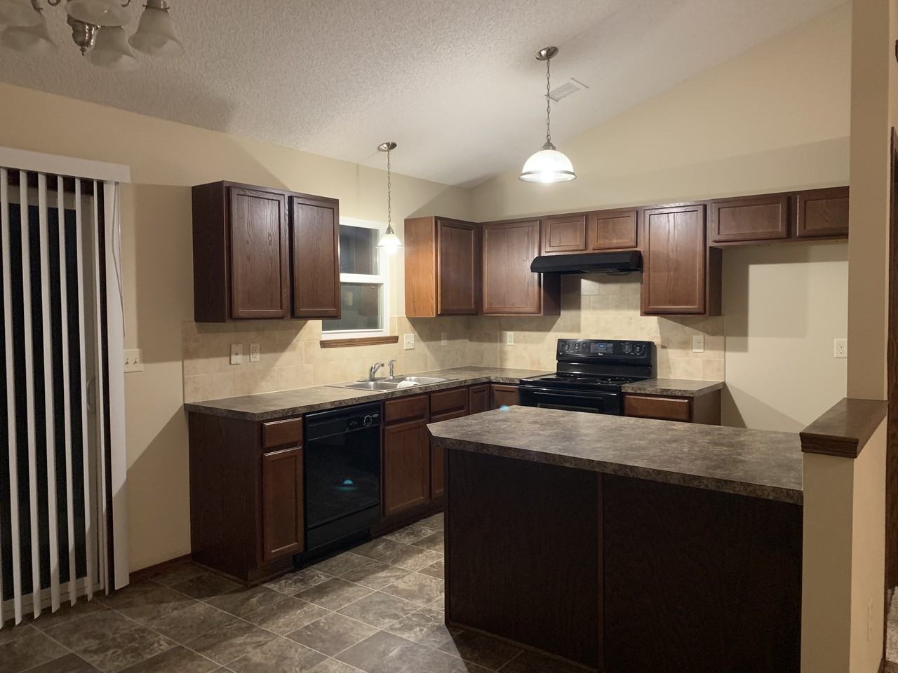 1230 W 43rd St S - Photo 2 of 10