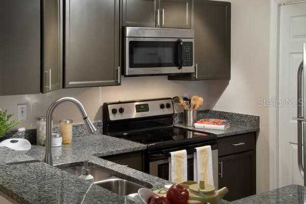 3021 State Road 590 303 - Photo 2 of 14