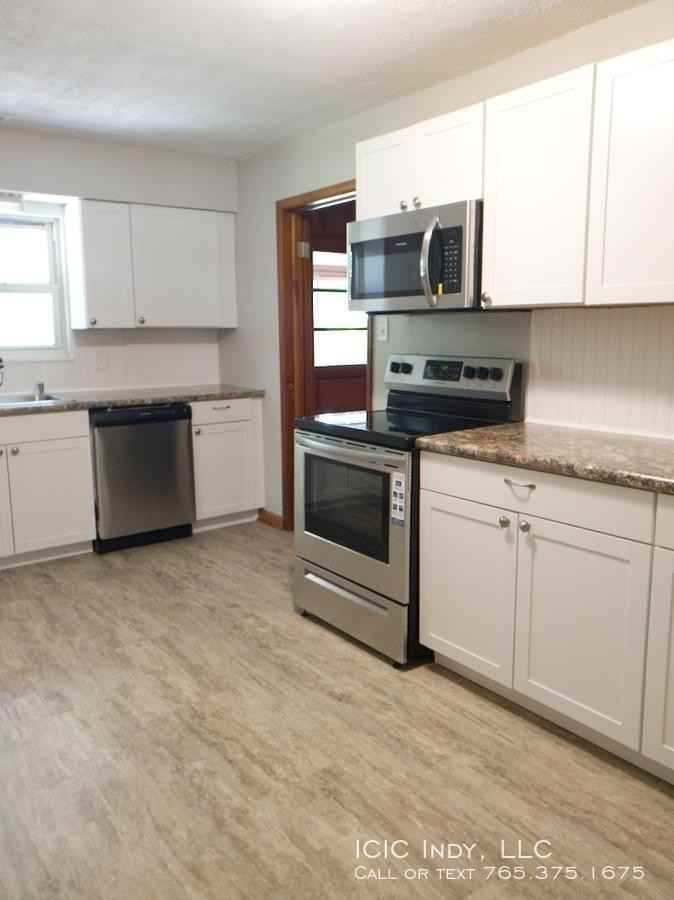 5505 Woodside Drive - Photo 3 of 13