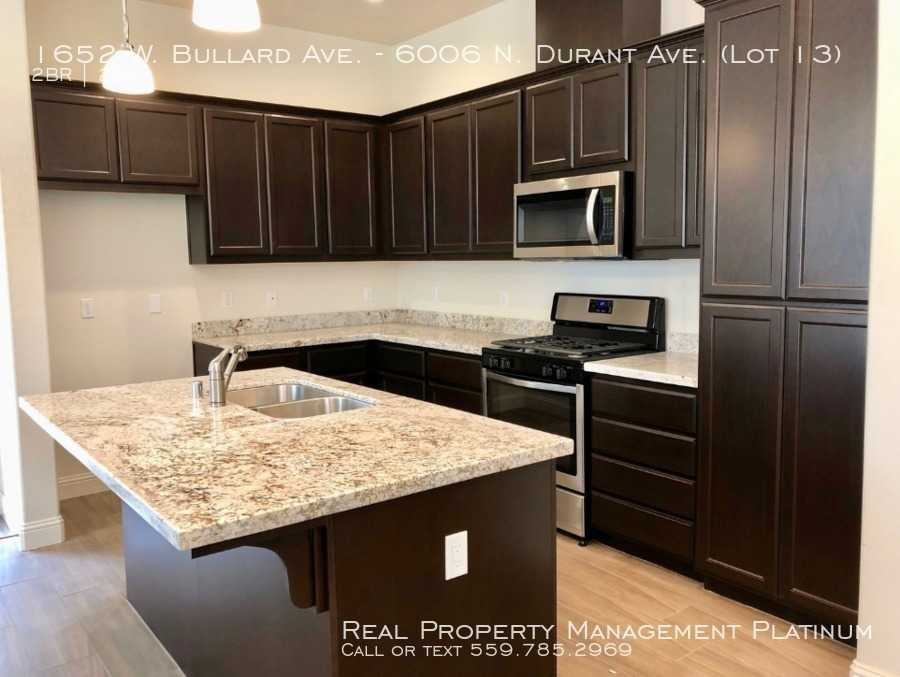 1652 W Bullard Ave - 6006 N Durant Ave - Photo 2 of 4