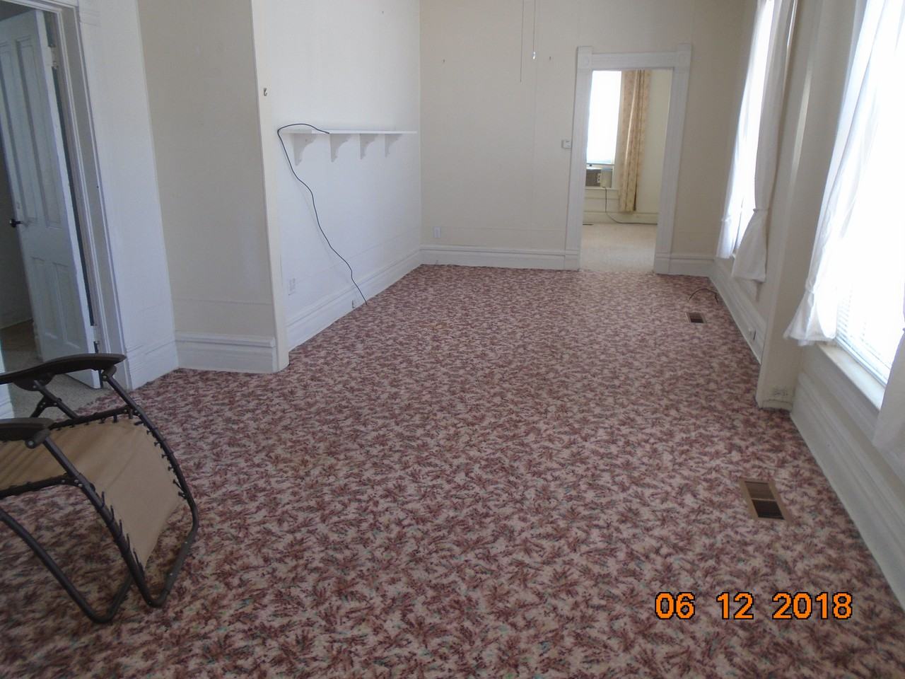 215 E 2nd St - Photo 2 of 12