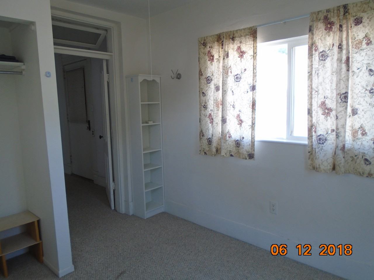 215 E 2nd St - Photo 3 of 12