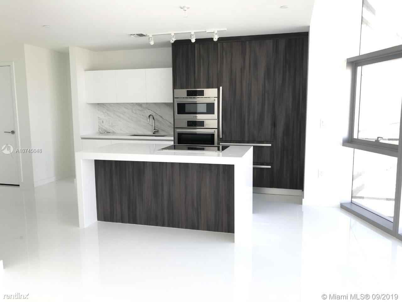 851 NE 1ST AVE - Photo 2 of 7